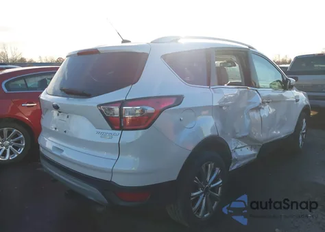 2017 Ford Escape Titanium z USA, uszkodzony, nr VIN 1FMCU0J94HUA64850